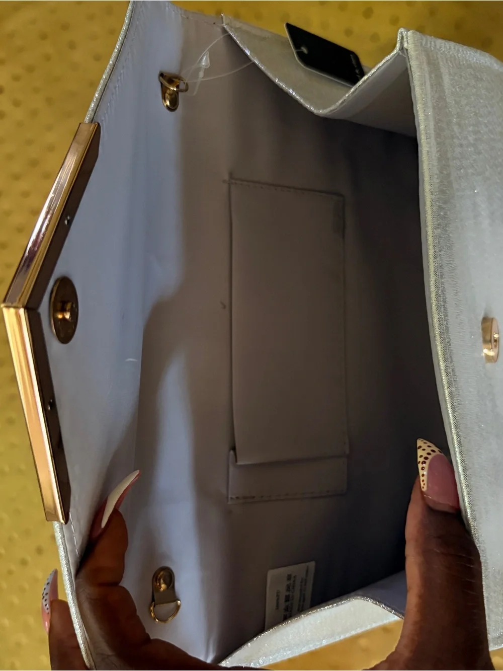 Shimmering Silver Envelope Clutch with Gold Accent